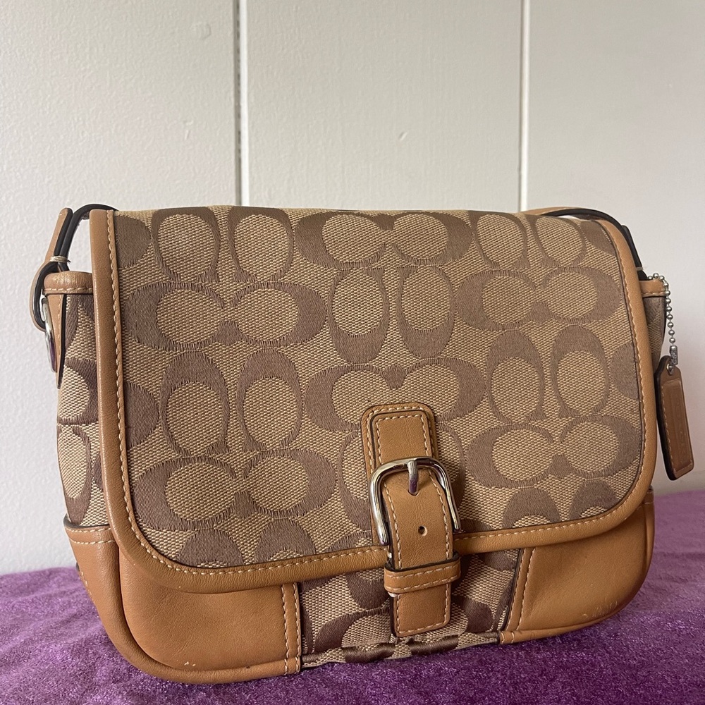 Coach Monogram Crossbody Bag with minor signs of usage.